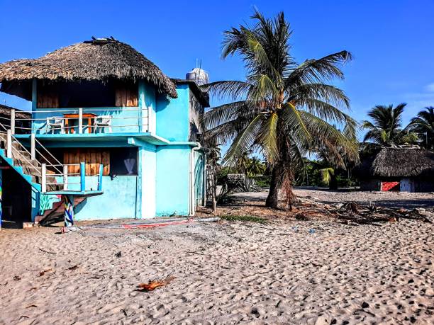 istock Chacahua & buildings with palapa 1388681506