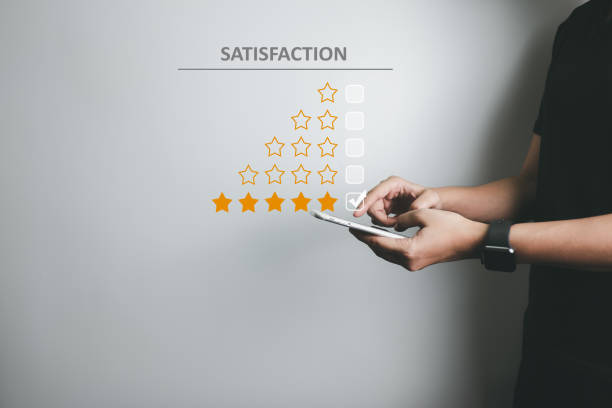 istock Satisfied customer experience concept, happy business customer using smartphone, the best review, High quality service, Most rated, the highest score, 5 stars, Social media very good. 1388692397