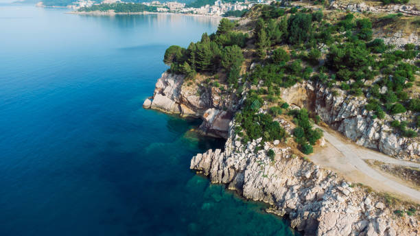 istock View from flying drone. Panoramic cityscape of becici, Budva, Montenegro. Top View. Beautiful destinations 1388695708