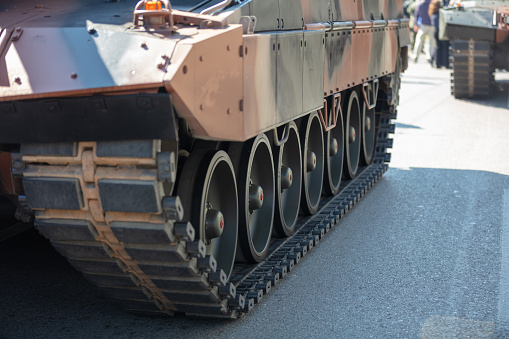 Military parade. Armored vehicle camouflage color, close up view, War weapon. Army equipment for fight and defense