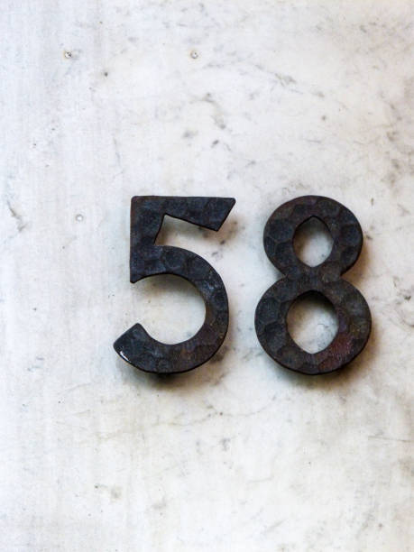 istock Metal home number on a wall 1388701794
