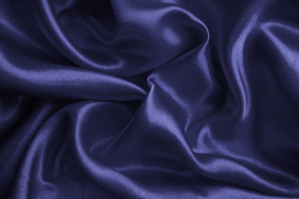 istock Minimalist purple fabric texture. Abstract very peri material wallpaper background. 1388702371