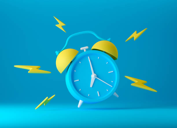 밝은 노란색 조명과 파란색 빈티지 울리는 알람 시계 - alarm clock 뉴스 사진 이미지