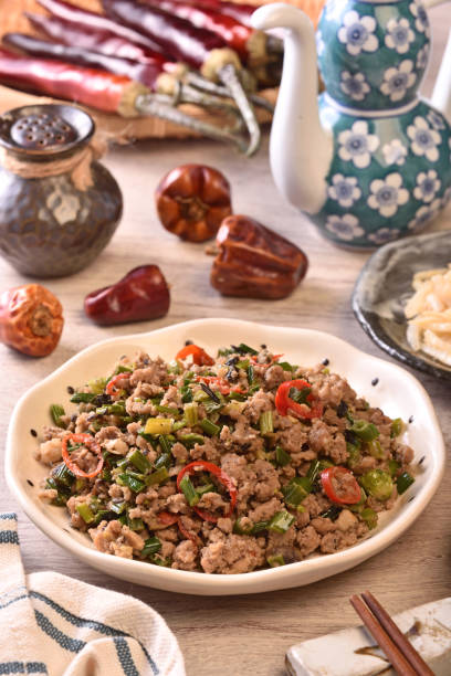 istock Sauteed minced pork with chive flowers in salted black bean 1388704641