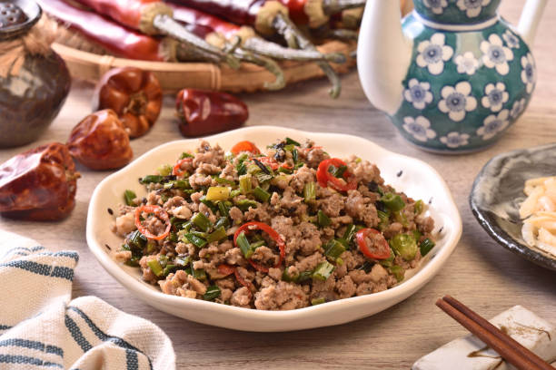 istock Sauteed minced pork with chive flowers in salted black bean 1388704750