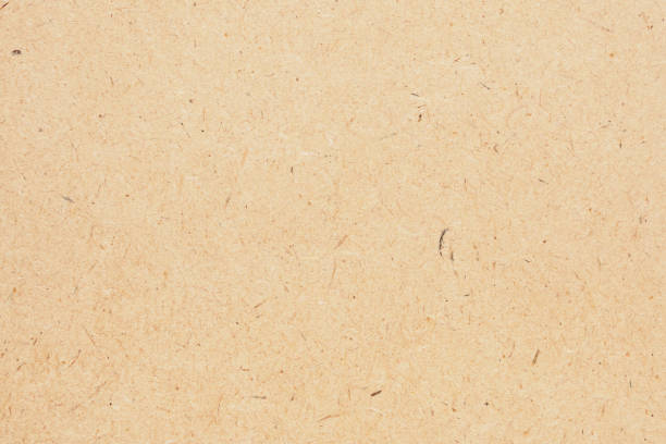 istock Old brown recycle cardboard paper texture background 1388705759