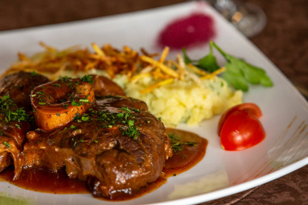 istock Meat dish with garnish on a plate 1388708605