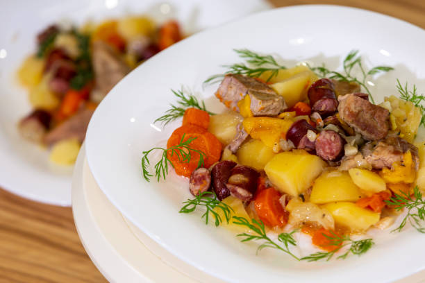 istock Ready dish of potatoes and meat on a plate 1388709781