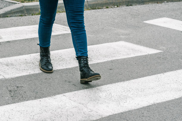 istock Pedestrians crossing. 1388711231