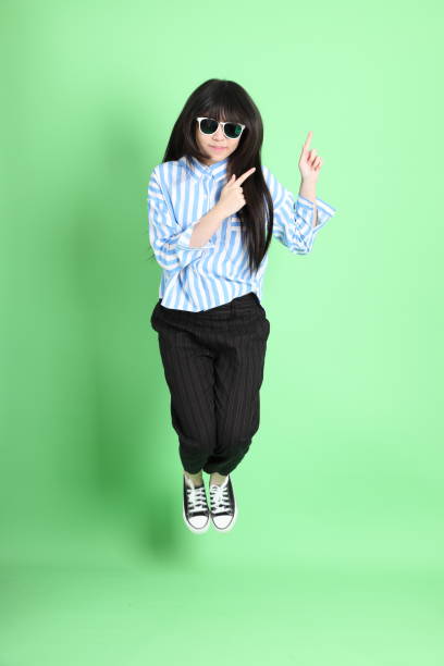 istock Happy Asian Girl 1388711331