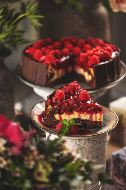 istock Slice of chocolate vanilla cake with raspberry jelly 1388711693