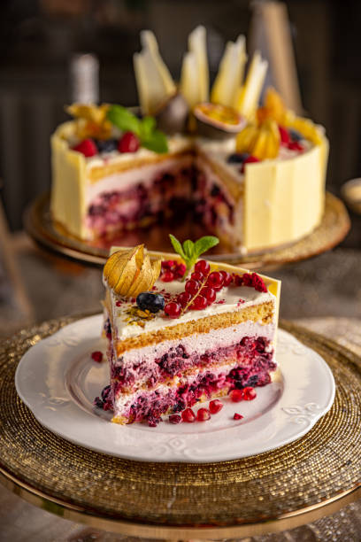 istock Portion of layered creamy fruit cake 1388714128