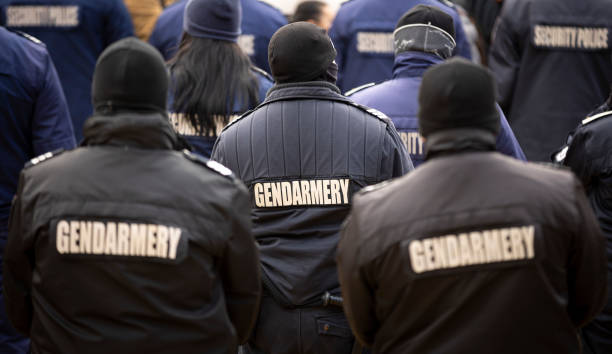 istock Police officers backs 1388716298