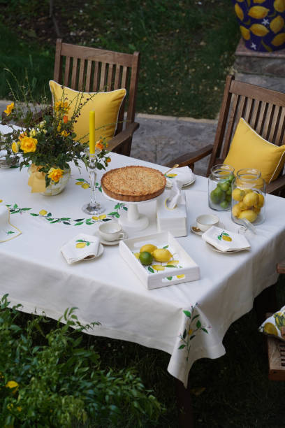 istock Table with apple pie, fruits snacks. Spring concept 1388717188