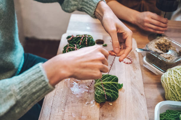 istock preparing vegan food on wooden kitchen table 1388718418