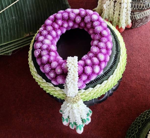 istock Jasmine Wreath with Yellow Roses on Pedestal Dish 1388722652