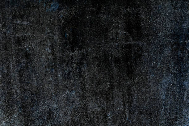 istock Dark grunge textured old abandoned cement plaster wall 1388722998