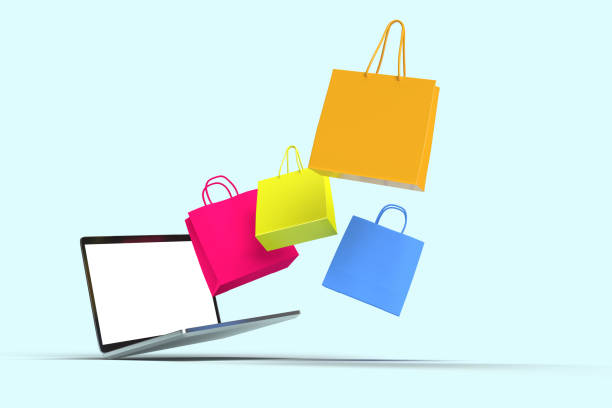 istock Laptop and Shopping Bag 1388723120