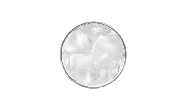 istock Glass with ice isolated on a white background 1388723166