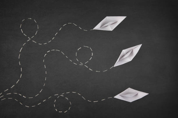 istock Leadership Concept with Paper Boat 1388725439