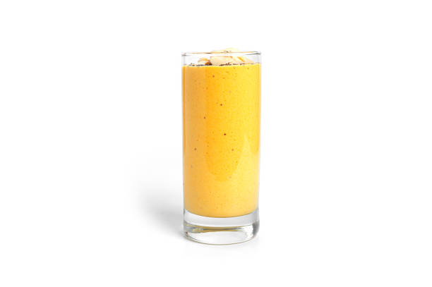 Mango yogurt with chia seeds and almonds isolated on white background. High quality photo