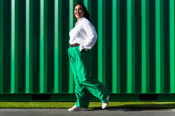 istock Maori woman  with big smile walking. 1388725554