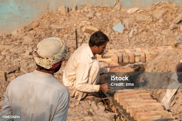 Finding Laborers Laborers Working On A Construction Site Stock Photo - Download Image ...