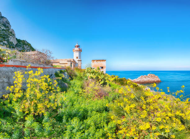 istock Stunning sunny day over Capo Zafferano Lighthouse. 1388729510