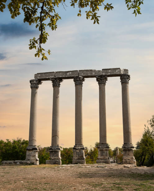 marble columns of temple of tyche at sunset - tyche stok fotoğraflar ve resimler