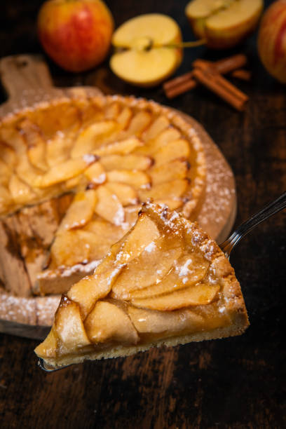 istock Delicious apple pie on a wooden table, from above 1388737220