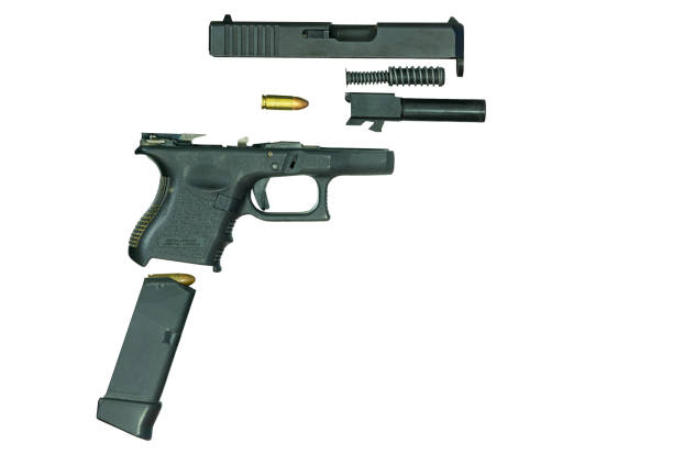 istock Disassembled handgun part on white background 1388739339