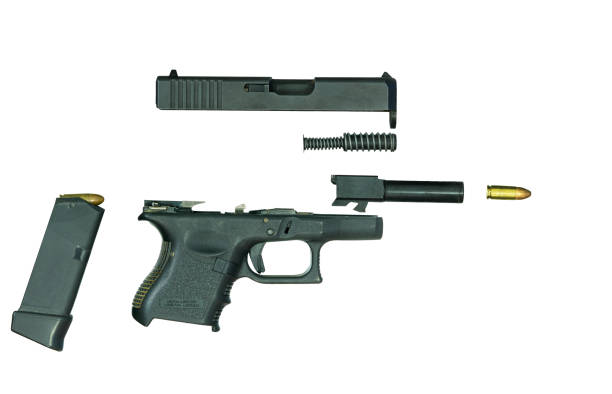 istock Disassembled handgun part on white background 1388739346