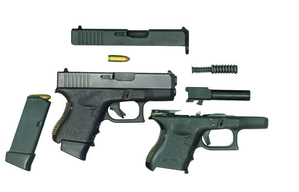 istock Disassembled handgun part on white background 1388739368