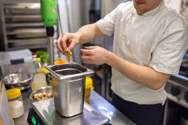 istock Chef making the sauce in the fast food restaurant kitchen 1388740783