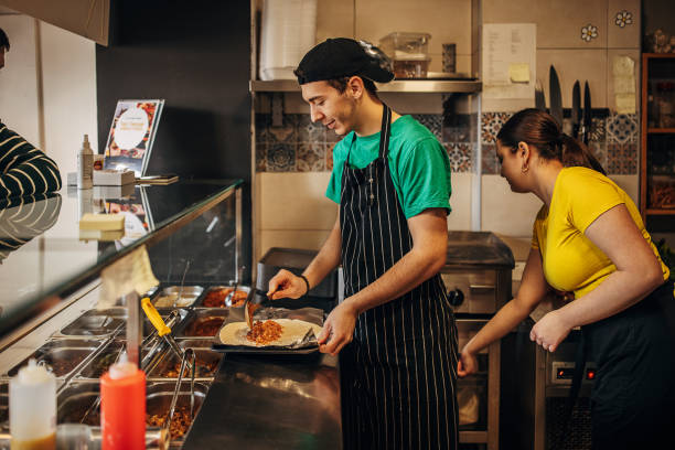 istock Chefs working in fast food restaurant 1388741035