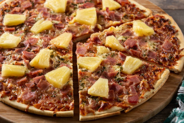 istock Hawaiian pizza with pineapple,ham and cheese 1388742477