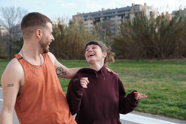 istock Two friends laughing and enjoying time together. 1388742580