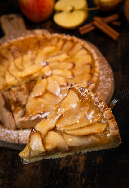 istock Delicious apple pie on a wooden table, from above 1388743645