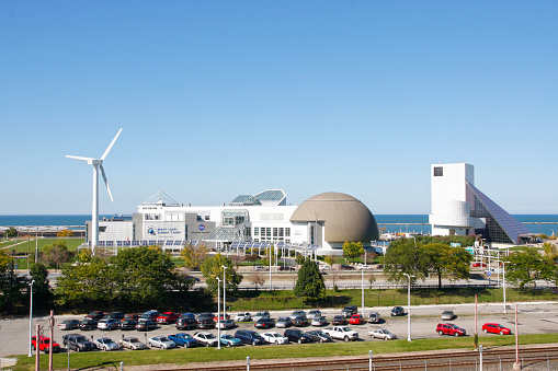 Cleveland, Ohio, USA - April 04, 2020: Daytime view of the Great Lakes Science Center located between First Energy Stadium and the Rock and Roll Hall of Fame at North Coast Harbor on the shore of Lake Erie