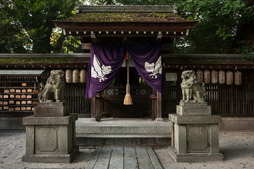 Horizontal view of the entrance gate to the Shinto Shrine of the Kyoto Imperial Palace Park in Central Kyoto, Japan