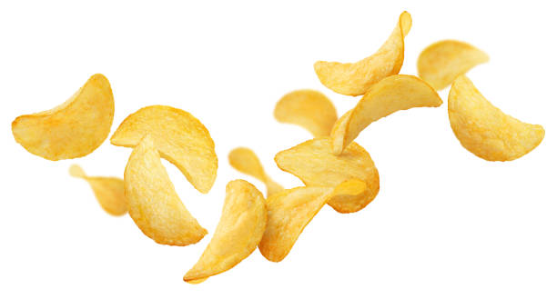istock Flying delicious potato chips on white 1388744377