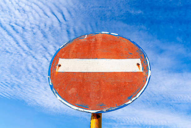Old rusty steet sign forbiden way, do not enter sign. The photo is taken in Bulgaria with Sony A7s3 camera.