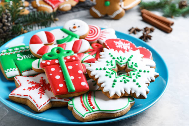 istock Delicious Christmas cookies on light marble table, closeup 1388754095