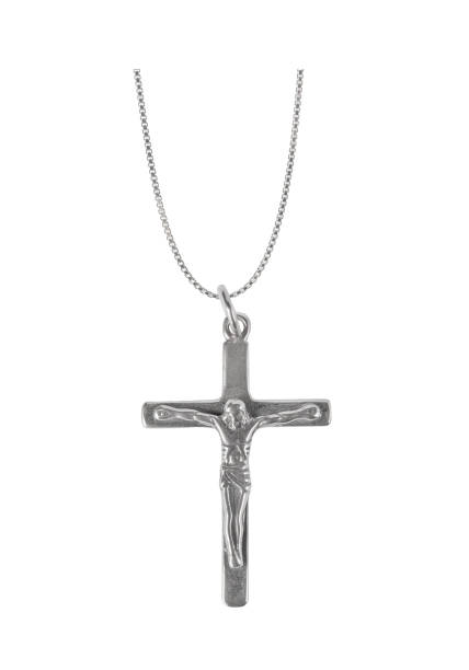 istock Silver crucifix necklace cross isolated on white background 1388761887
