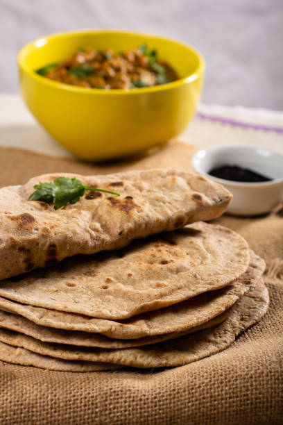istock Flat bread on burlap and a yellow bowl in the background 1388762316