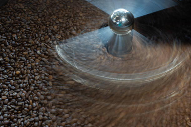 istock Coffee roasting equipment in action 1388762330
