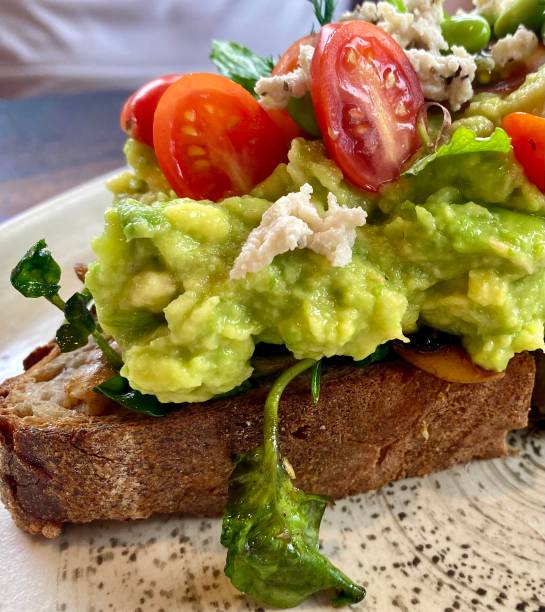 istock Avocado and tomato toast on rye bread 1388763639