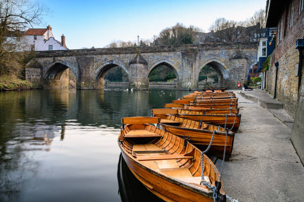 Rowing Boats below Elvet Bridge in Durham Durham is a city in County Durham in the northeast of England built on the banks of River Wear river wear stock pictures, royalty-free photos & images