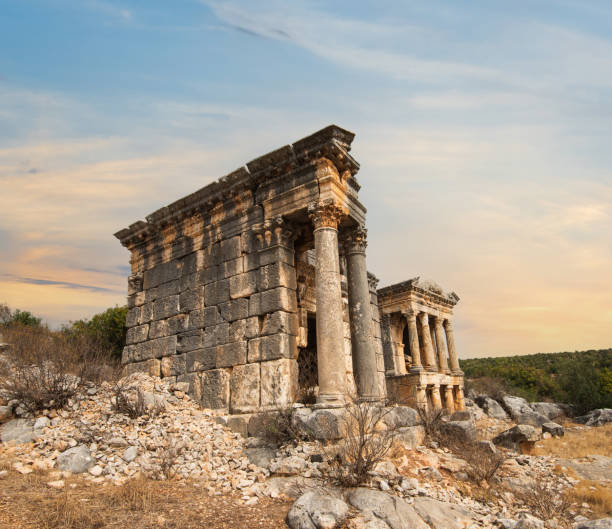 Uzuncaburc antique city mausoleums. Uzuncaburc antique city mausoleums. Historic area is in the rural area of Silifke district. Goddess of fortune. Roman, late first century AD. Silifke- Mersin - Turkey uzuncaburc stock pictures, royalty-free photos & images
