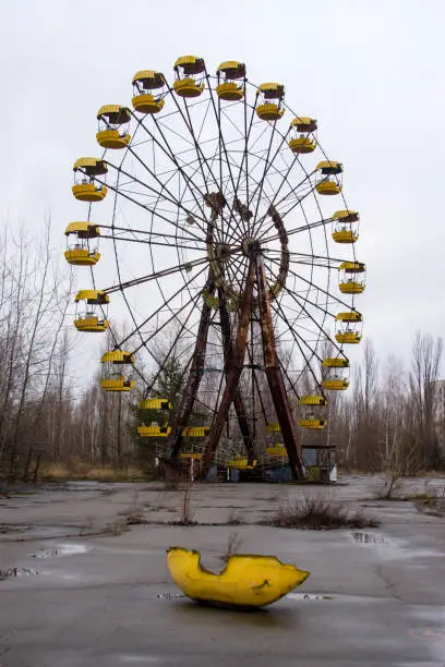 Ferris wheel in the City of Pripyat. Apocalyptic city of Pripyat after a nuclear explosion at a nuclear power plant. Chernobyl disaster.